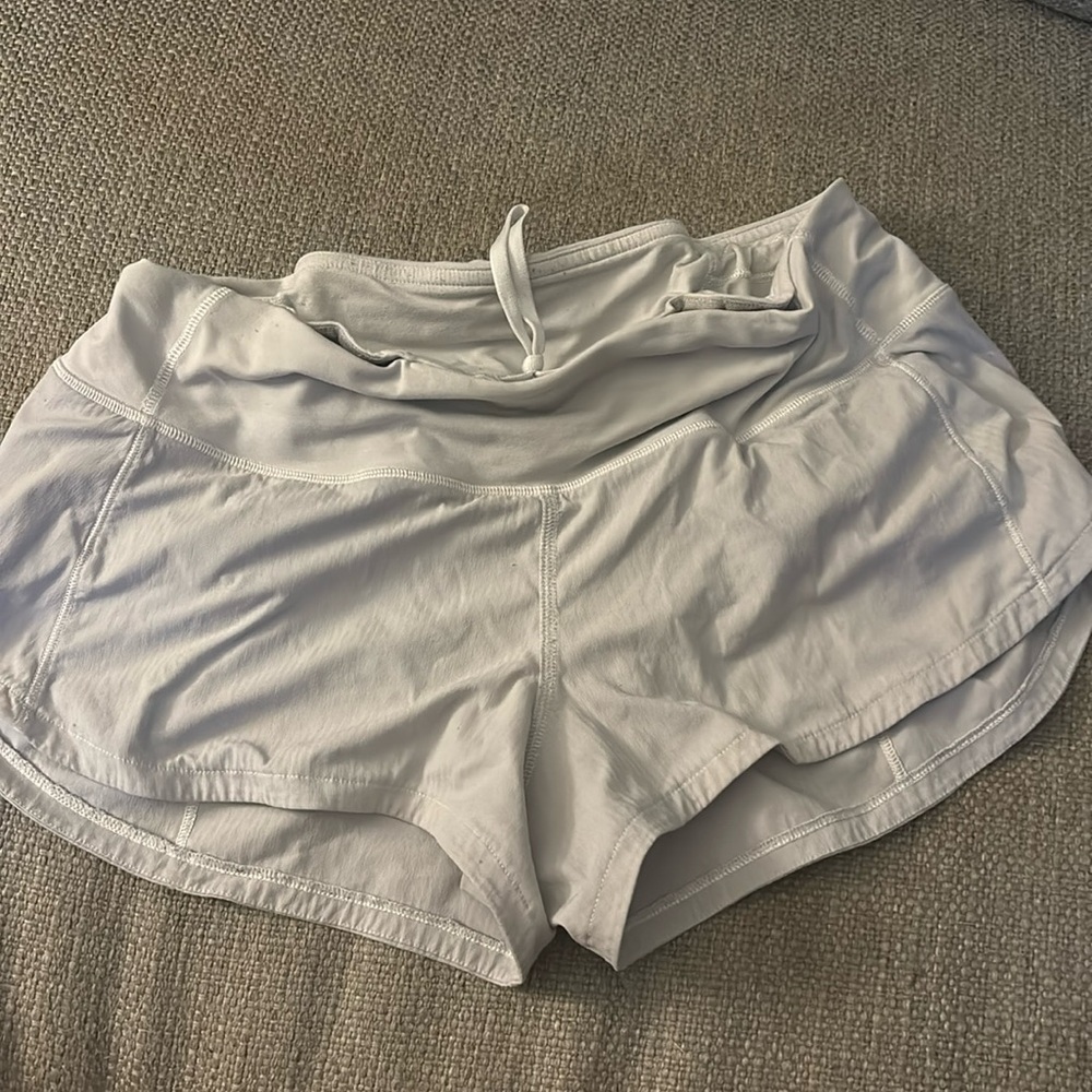 white 2.5” lululemon speed ups size 4